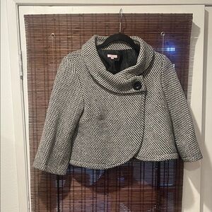 Elegant Black and White Women's cropped Cape Jacket with three quarter sleeves.
